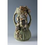 Jugendstil tabletop vase, AMPHORA. Austria, ca. 1910.Enamelled porcelain.An ornamental table vase by