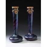 Pair of Jugendstil LOETZ vases; Austria, ca. 1895.Iridescent blown glass.Pair of iridescent blown