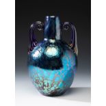LOETZ Art Deco vase; Austria, ca. 1920.Iridescent blown glass.An iridescent blown glass vase from