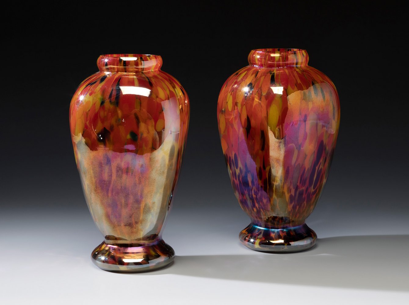 Pair of Jugendstil LOETZ vases; Austria, ca. 1900.Iridescent blown glass.Pair of iridescent blown