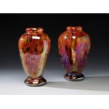 Pair of Jugendstil LOETZ vases; Austria, ca. 1900.Iridescent blown glass.Pair of iridescent blown