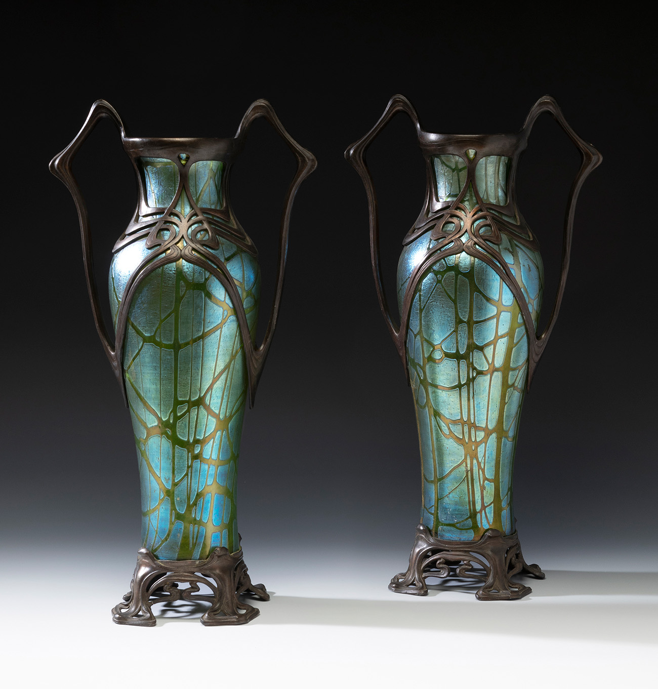 Pair of Jugendstil LOETZ vases; Austria, ca. 1895.Iridescent blown glass.Pair of iridescent blown