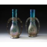 Pair of Jugendstil LOETZ vases; Austria, ca. 1895.Iridescent blown glass.Pair of iridescent blown