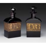 MOSER. Czechoslovakia, ca. 1910.Pair of perfume bottles.Moulded glass.Signed on the reverse of the