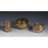 Set of two jewellery boxes and compact. France, late 19th century.Moulded glass. Gilt metal.The