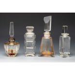 Four Art Deco perfume bottles. France ca. 1940. Moulded glass.Provenance: Spanish private