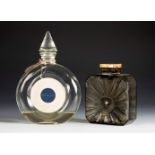 "Vol de Nuit" and "Mitsuoko" two GUERLAIN fragrances. France, 1960s.Moulded glass bottles, one metal
