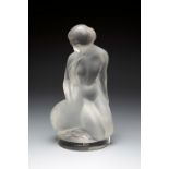 LALIQUE."Leda and the Swan. France, ca. 1960.Figure in moulded and satin-finished glass.Signed on