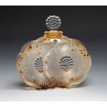 LALIQUE. France ca. 1970.Perfume bottle "Deux fleurs".Moulded and satin-finished glass.Signed on the