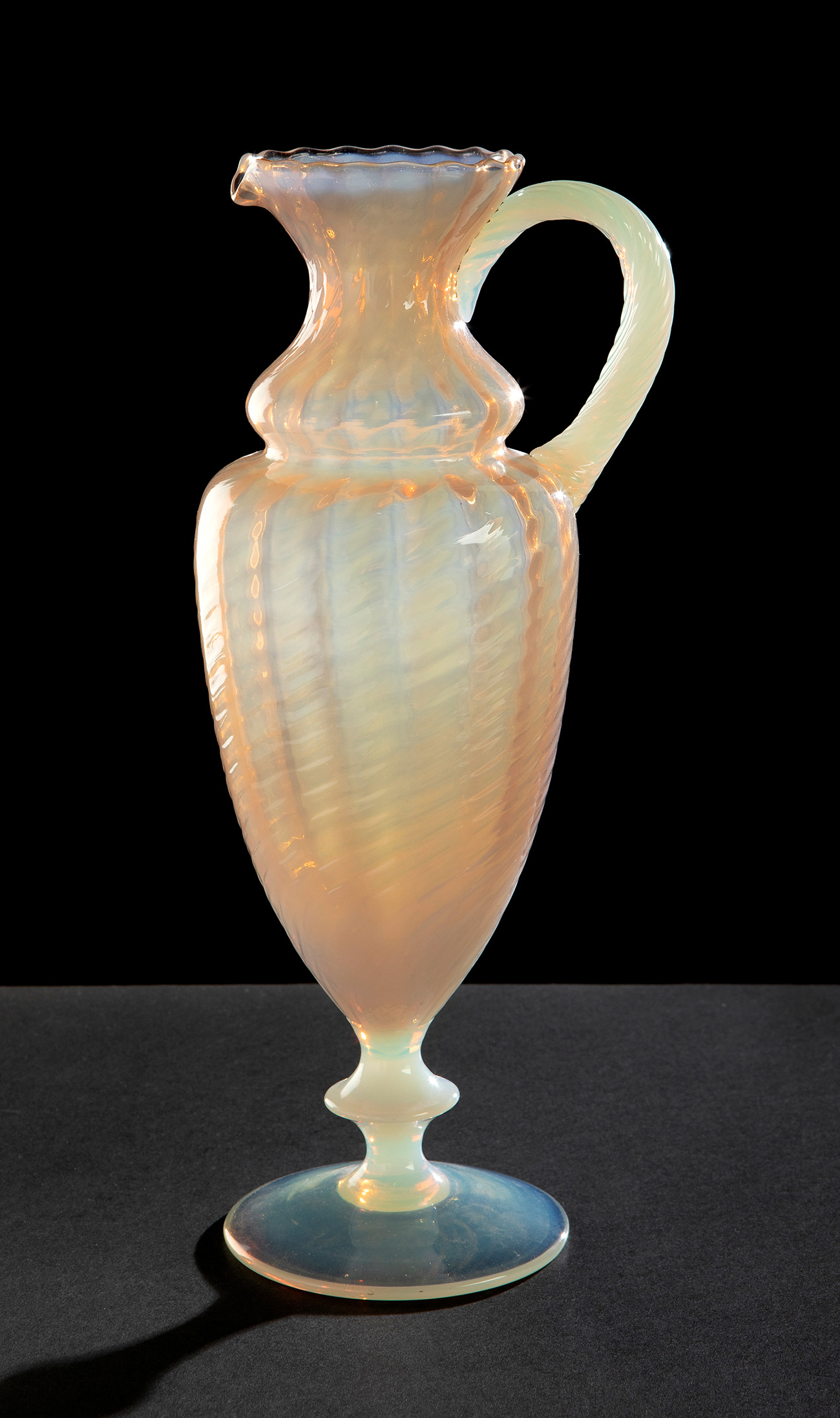 Pitcher with spout. Murano, second half of the 20th century.Blown Murano glass.Provenance: Private