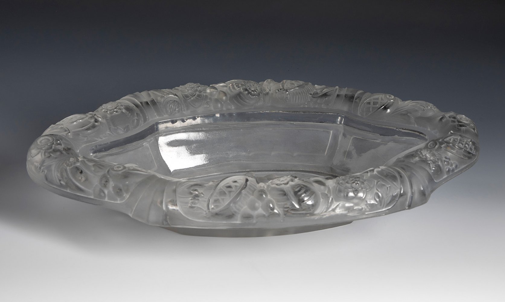 Oval centre. France, mid-20th century.Moulded glass.Wear and tear due to use and the passage of