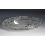 Oval centre. France, mid-20th century.Moulded glass.Wear and tear due to use and the passage of