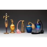 Set of five atomising perfume burners, first half of the 20th century.Moulded, carved and