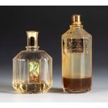 "Embrujo de Sevilla" and "Nueva Maja", two MYRURGIA fragrances. Years 50-60.Moulded glass bottles.
