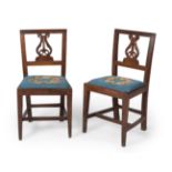 Pair of Fernandina period chairs, first third of the 19th century.Walnut wood and fabric.