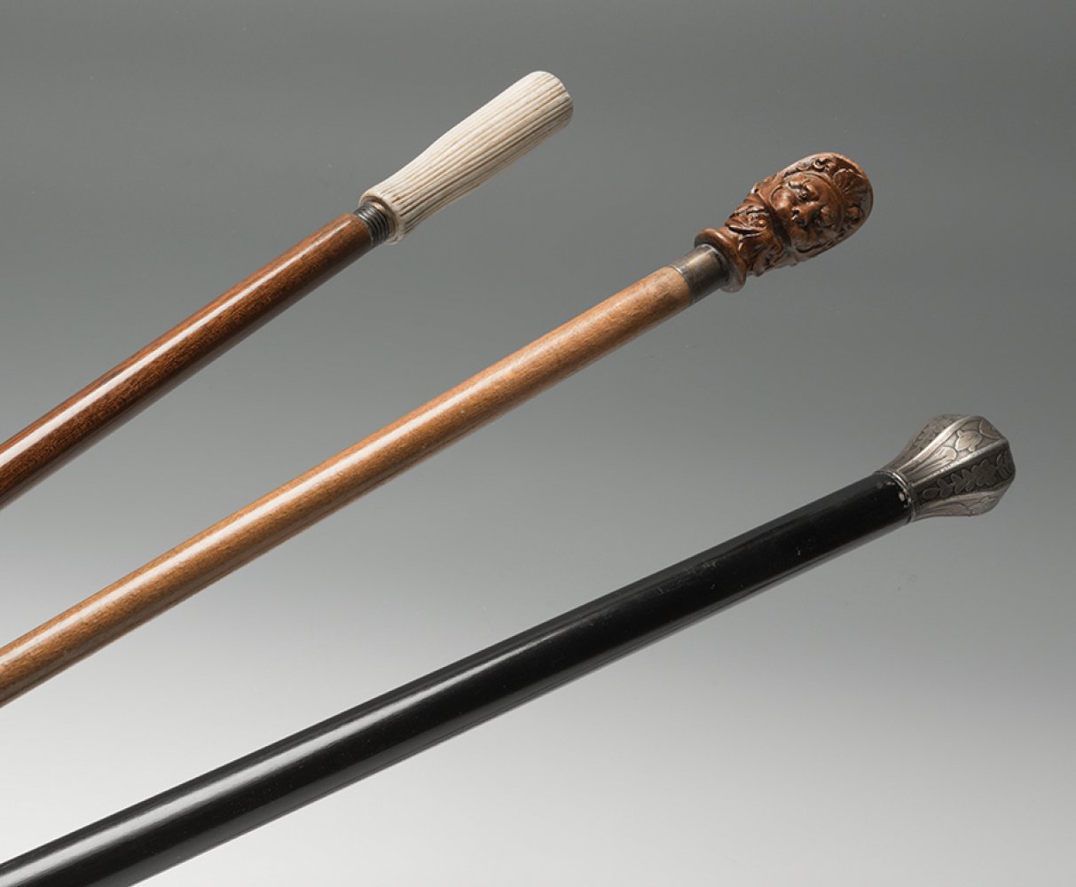 A set of five canes, late 19th-early 20th century. Various materials: bone, silver, wood and - Image 2 of 3