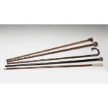 A set of five canes, late 19th-early 20th century. Various materials: bone, silver, wood and