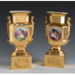 Pair of Empire vases. France, early 19th century.Hand-painted porcelain gilded in fine gold.It shows