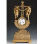 Restoration period clock, France, ca. 1820.Gilt bronze.The machinery is in need of repair. The