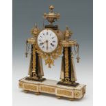 Table clock; Louis XVI, late 18th century.Gilt bronze, porcelain plates and white marble.