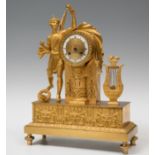 Empire period clock; France, circa 1810.Mercury gilt bronze.Precise setting.Measurements: 47 x 36