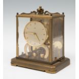 Pendulum clock; Schatz, Germany, 20th century.Gilt metal.In need of restoration.Missing pieces.