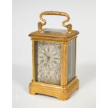 Carriage clock; late 19th century.Gilt bronze.8 days winding.Aiguilles movement.Needs restoration.