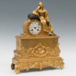 Table clock; Louis Philippe, ca.1840.Gilt and blued bronze.It has Paris machinery.Measurements: 40 x