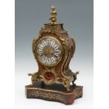 Boulle style clock; France, late 19th century.Gilt bronze, ebonised wood and brass marquetry.