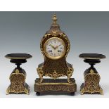 Boulle style clock with garniture; France, late 19th century.Gilt bronze, ebonised wood and