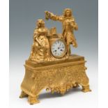 Elizabethan style table clock; circa 1840.Gilt bronze.Measurements: 53 x 42,5 x 14 cm.Elizabethan