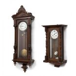 Set of two Alfonsinos clocks; late 19th century.Carved wood.No key preserved.In need of repair.