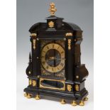Clock; Genoese work, first quarter of the 18th century.Ebonised wood and bronze applications.It