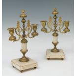 Pair of candlesticks for trimmings; XIX century.Marble and gilt metal.Measurements: 32 x 17,5 x 10