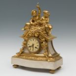 Napoleon III clock; circa 1870.Gilt bronze and white marble.Paris movement.Measures: 41.5 x 28.5 x