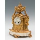 Napoleon III style clock; France, late 19th century.Gilt bronze and marble.Measurements: 37 x 27 x