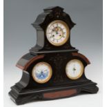 Napoleon III Clock; France, late 19th century.Black marble and bronze.With perpetual lunar