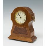 Clock; England; early 20th century.Wood.Measurements: 18.5 x 14.5 x 7 cm.English table clock, made