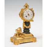 Louis XVI clock, France, late 19th century.Gilt and polychrome bronze.It has later hands.Key