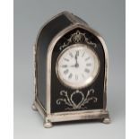 Travel clock, silver. English. Late XIX century, Edwardian style. Silver and bronze, with