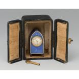 Table clock. Late 19th century. Silver and blue guilloché enamel. White dial, Arabic numerals,