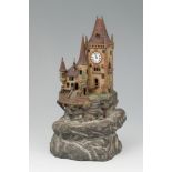 Table clock. Central Europe. Late 19th century. Model representing a castle, typical of Central