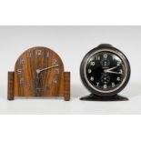 Set comprising two alarm clocks; 20th century.Wood and metal.In need of restoration.Measurements: 13