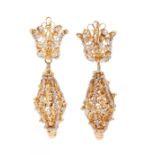Pair of Valencian earrings made in 18 kt yellow gold, long with openwork movement with small
