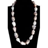 Long necklace of multicolored baroque pearls from the natural orient. Baroque pearls are simply
