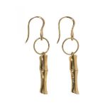 GUCCI. "Bamboo".Pair of long earrings with movement, in 18kt yellow gold. Hook clasp. Weight: 11.4