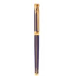 ÉLYSÉE FOUNTAIN PEN.Gold plated brass barrel and lacquer.Two-tone 18Kts gold nib, M-point.Limited