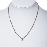 Choker made by smoky quartz beads with teardrop-shaped white gold pendant and centered by two