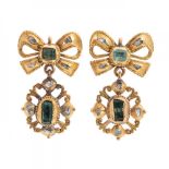Pair of yellow gold and emeralds earrings. Long model with two bodies, the upper one with a loop and
