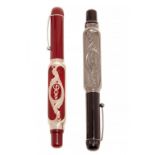 OMAS "DOCTOR'S" FOUNTAIN PENS.Resin and silver body.Nib in 18 Kts gold. F/M nib.Limited edition.No